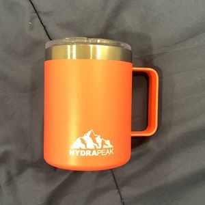Coral colored hydrapeak travel coffee mug